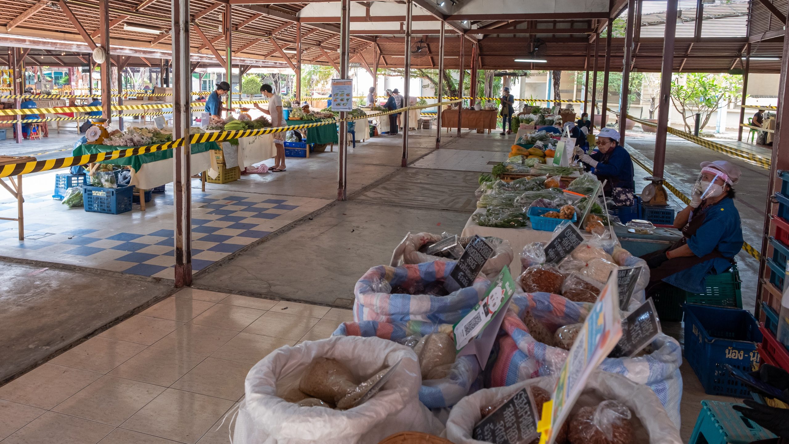 Newly re-opened food market in Chiang Mai, Thailandwith social distancing restrictions due to Covid 19 pandemic and lock down